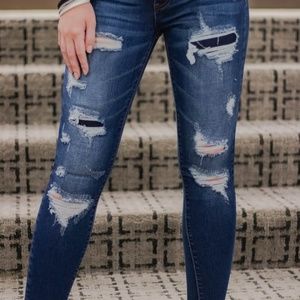 The Elena Mid Rise Distressed Skinny